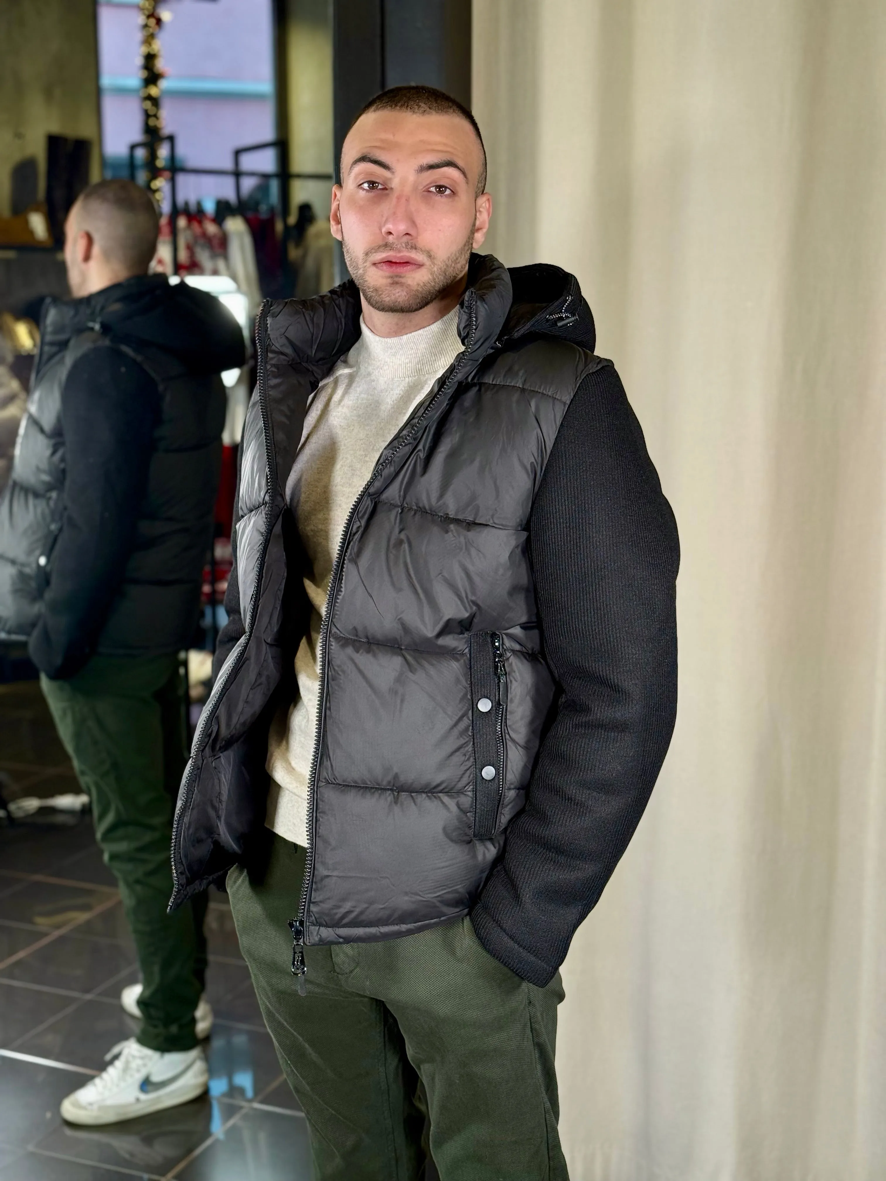 Piumino nero con inserti in maglia 528
